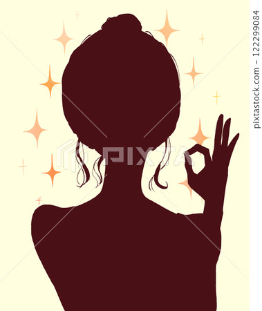Young woman OK sign sparkling silhouette 122299084