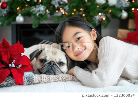Pug and Child Snuggling by the Cozy Fireplace Pug and Child Snuggling by the Cozy Fireplace 122300054