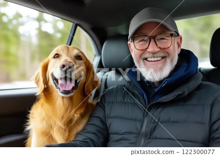 Happy Golden Retriever enjoying car ride with owner Happy Golden Retriever enjoying car ride with owner 122300077