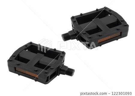 Black bicycle pedal isolated on white background. Detail of bicycle pedal Black bicycle pedal isolated on white background. Detail of bicycle pedal 122301093