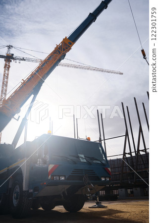 Car mounted crane low angle view Car mounted crane low angle view 122301759