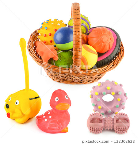 Set of toys for dogs in a wicker basket isolated on a white . Collage. 122302628