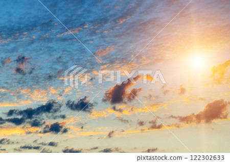 Cloudy sky and bright sunrise. Cloudy sky and bright sunrise. 122302633