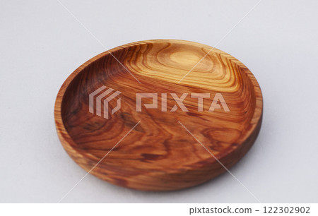 Wooden kitchen utensils stacked view close up isolated 122302902