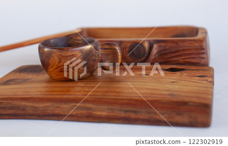 Wooden kitchen utensils stacked view 122302919