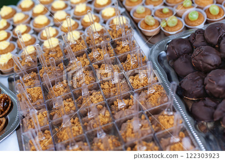 Various pastries on a caterer stall Various pastries on a caterer stall 122303923
