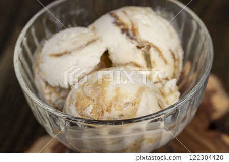 balls of creamy ice cream with the addition of natural maple syrup balls of creamy ice cream with the addition of natural maple syrup 122304420