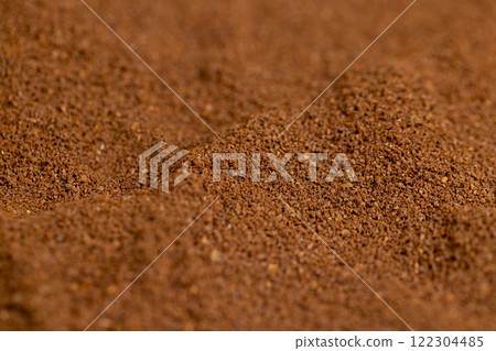 a large amount of ground coffee powder close up a large amount of ground coffee powder close up 122304485
