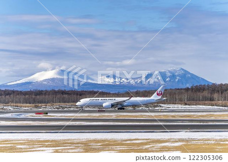 Planes at New Chitose Airport in winter, Mount Tarumae and Mount Fusubushi, Chitose, Hokkaido Planes at New Chitose Airport in winter, Mount Tarumae and Mount Fusubushi, Chitose, Hokkaido 122305306