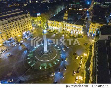 Drone view on Liberty square (tower) and high building in distance (maybe hotel) Drone view on Liberty square (tower) and high building in distance (maybe hotel) 122305463