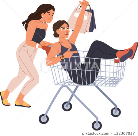 Cheerful woman is sitting in a shopping cart raising her arms and holding shopping bags, while her friend runs pushing the cart, expressing joy and excitement after successful shopping 122307037