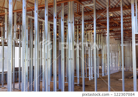 Building large commercial building requires use of steel beams profiles Building large commercial building requires use of steel beams profiles 122307084