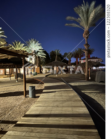 Well-equipped city beach on the Eilat embankment Well-equipped city beach on the Eilat embankment 122308320