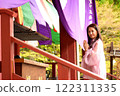 Senior woman praying with hands together 122311335