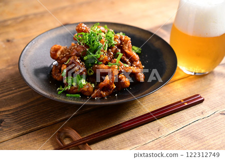 Deep fried chicken skin with sweet and sour sauce Deep fried chicken skin with sweet and sour sauce 122312749