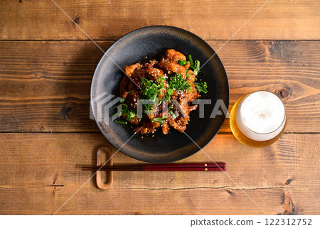 Deep fried chicken skin with sweet and sour sauce 122312752