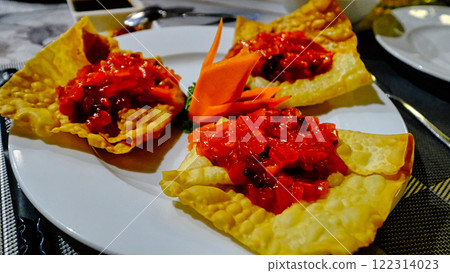 Crispy fried gyoza skin and chili shrimp 122314023