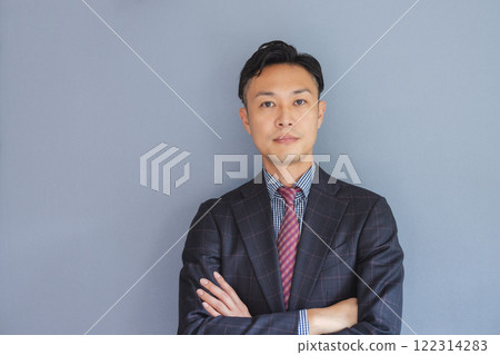 Businessman with arms crossed Businessman with arms crossed 122314283