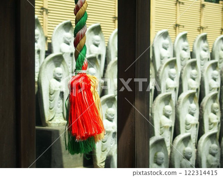 Temple bell rope and Mizuko Jizo Temple bell rope and Mizuko Jizo 122314415