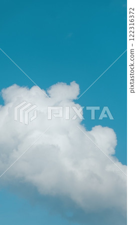 Blue Sky White Clouds. Landscape White Clouds. Building Motions Clouds. Summer Blue Sky. Vertical Time Lapse. Blue Sky White Clouds. Landscape White Clouds. Building Motions Clouds. Summer Blue Sky. Vertical Time Lapse. 122316372