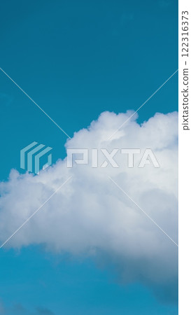 Convection In Atmosphere. Nature Blue Sky Clear Weather Background. White Clouds Background. Vertical Time Lapse. Convection In Atmosphere. Nature Blue Sky Clear Weather Background. White Clouds Background. Vertical Time Lapse. 122316373