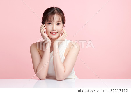 Beautiful young asian woman with clean fresh skin on pink background, Face care, Facial treatment, Cosmetology, beauty and spa, Asian women portrait. 122317162