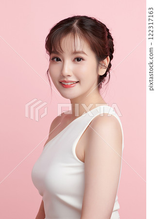 Beautiful young asian woman with clean fresh skin on pink background, Face care, Facial treatment, Cosmetology, beauty and spa, Asian women portrait. 122317163