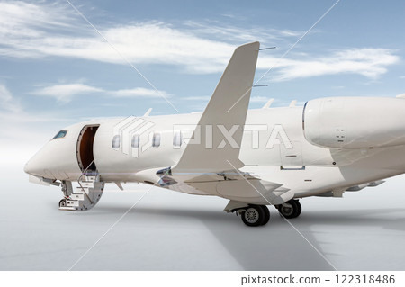 Close-up modern white executive airplane with an opened gangway door isolated on bright background with sky Close-up modern white executive airplane with an opened gangway door isolated on bright background with sky 122318486