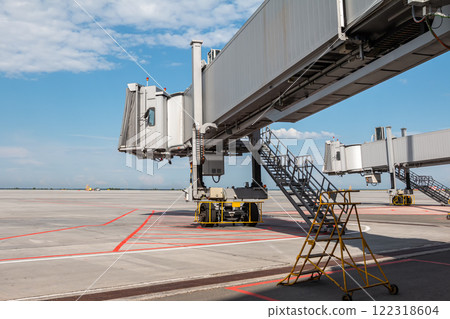 Empty passenger air bridges at airport apron 122318604