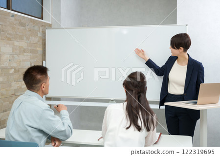 A female businesswoman giving a seminar for seniors 122319695