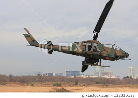 AH-1S Cobra attack helicopter approaching at low altitude AH-1S Cobra attack helicopter approaching at low altitude 122320152