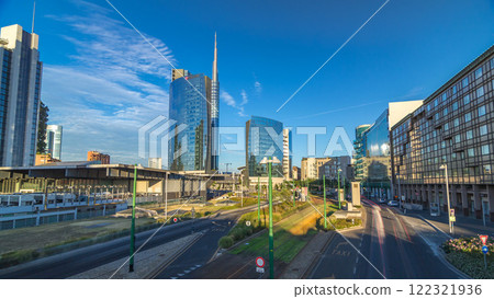 Milan skyline with modern skyscrapers in Porta Nuova business district timelapse hyperlapse in Milan, Italy, at sunset. 122321936