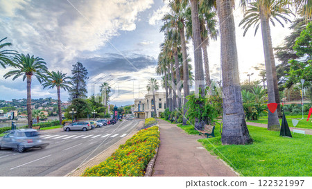 Evening view to palms on the center street of Beaulieu-sur-Mer timelapse hyperlapse. 122321997