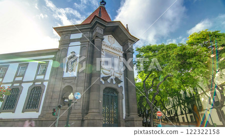 Banco de Portugal on the Avenida Arriaga timelapse hyperlapse in Funchal, Madeira, Portugal. Banco de Portugal on the Avenida Arriaga timelapse hyperlapse in Funchal, Madeira, Portugal. 122322158