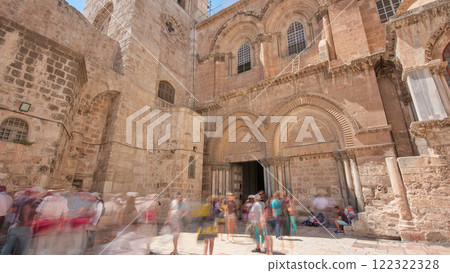 People enter to the Church of the Holy Sepulcher timelapse hyperlapse. 122322328