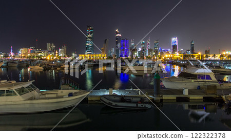 Yachts and boats at the Sharq Marina night timelapse hyperlapse in Kuwait. Kuwait City, Middle East Yachts and boats at the Sharq Marina night timelapse hyperlapse in Kuwait. Kuwait City, Middle East 122322378