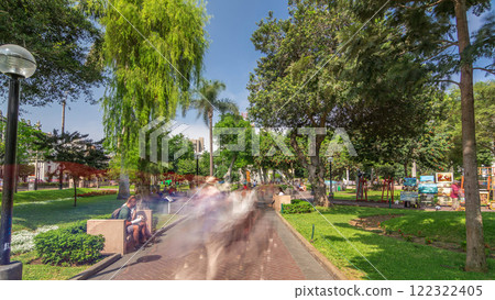 Miraflores central park timelapse hyperlapse Place for relax with green trees and lawn in Peruvian capital. Lima, Peru Miraflores central park timelapse hyperlapse Place for relax with green trees and lawn in Peruvian capital. Lima, Peru 122322405