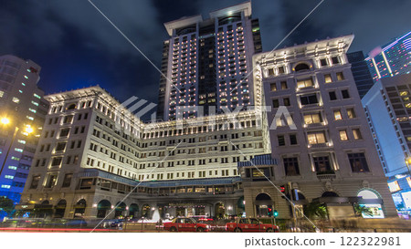 City traffic near the Peninsula hotel Hong Kong timelapse hyperlapse at night, Hong Kong City traffic near the Peninsula hotel Hong Kong timelapse hyperlapse at night, Hong Kong 122322981