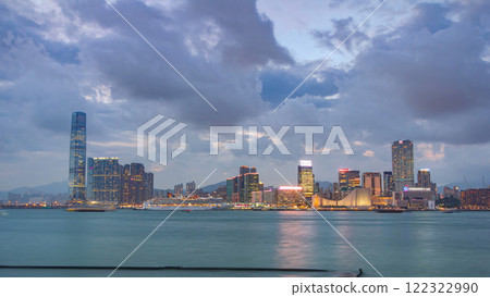 Skyline panorama timelapse day to night with International Commerce Centre in West Kowloon, Hong Kong. Skyline panorama timelapse day to night with International Commerce Centre in West Kowloon, Hong Kong. 122322990