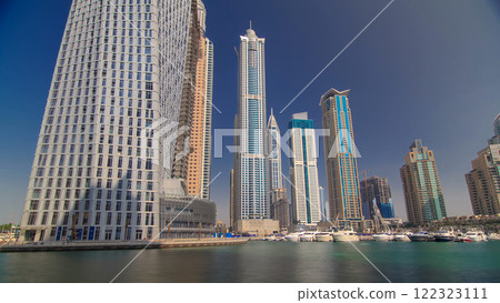 Dubai Marina with tallest skyscrapers and boats timelapse hyperlapse 122323111