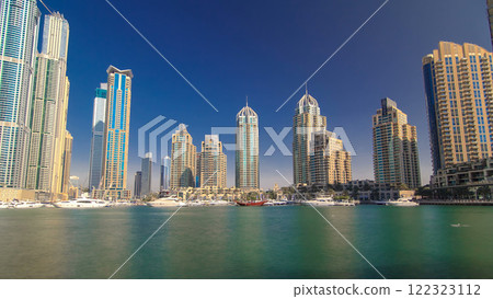 Dubai Marina with tallest skyscrapers and boats timelapse hyperlapse Dubai Marina with tallest skyscrapers and boats timelapse hyperlapse 122323112