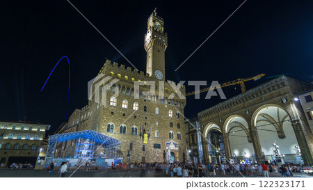 Arnolfo tower of Palazzo Vecchio timelapse hyperlapse on the Piazza della Signoria at twilight in Florence, Tuscany, Italy Arnolfo tower of Palazzo Vecchio timelapse hyperlapse on the Piazza della Signoria at twilight in Florence, Tuscany, Italy 122323171