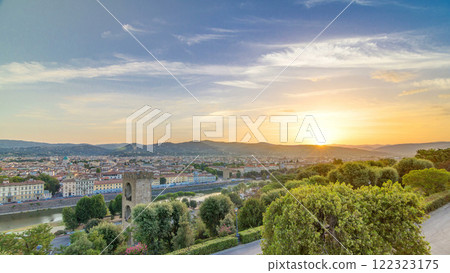 Sunrise top view of Florence city timelapse with arno river bridges and historical buildings 122323175