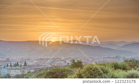 Sunrise top view of Florence city timelapse with arno river bridges and historical buildings 122323178