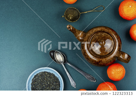 Mandarin tea in ceramic tea pot. 122323313