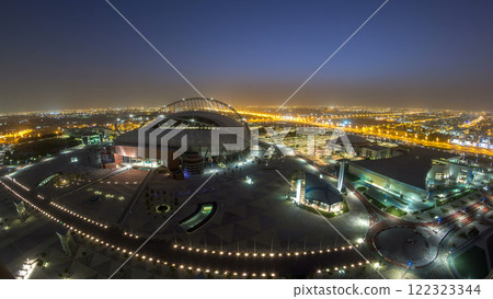 Aerial view of Aspire Zone stadium from top night to day timelapse in Doha Aerial view of Aspire Zone stadium from top night to day timelapse in Doha 122323344