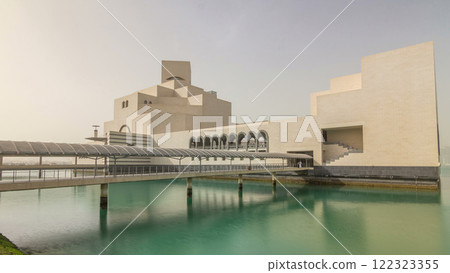 Qatar's museum of Islamic Art timelapse hyperlapse on its man-made island beside Qatar's museum of Islamic Art timelapse hyperlapse on its man-made island beside 122323355