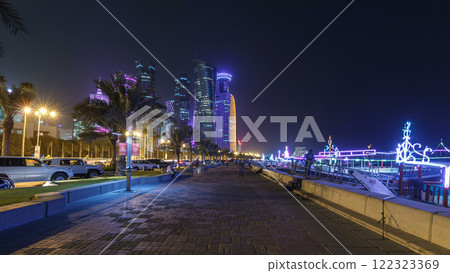 The skyline of Doha by night with starry sky seen from Corniche timelapse hyperlapse, Qatar The skyline of Doha by night with starry sky seen from Corniche timelapse hyperlapse, Qatar 122323369