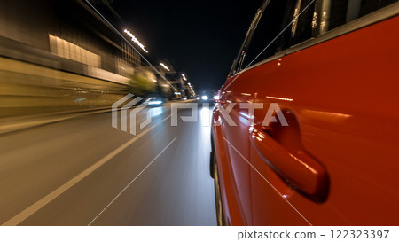 Drivelapse from side of car moving on a night avenue in city timelapse hyperlapse Drivelapse from side of car moving on a night avenue in city timelapse hyperlapse 122323397