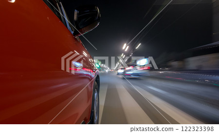 Drivelapse urban look from fast driving car at a night avenue in a city timelapse hyperlapse Drivelapse urban look from fast driving car at a night avenue in a city timelapse hyperlapse 122323398